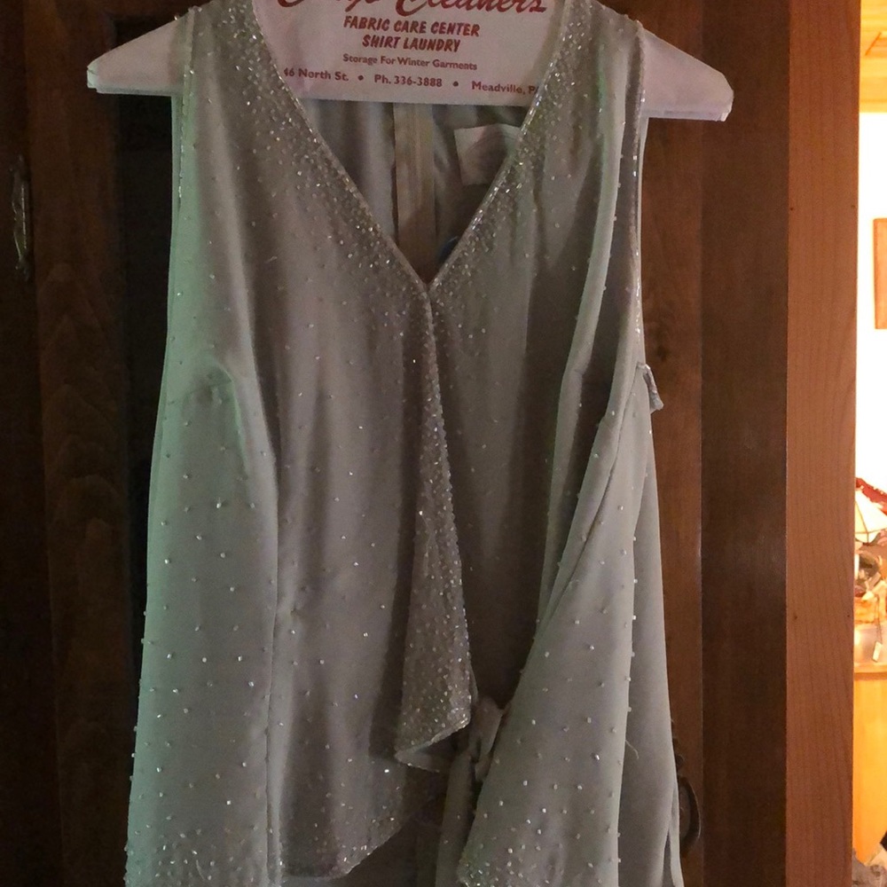 Mother of the bride groom 2 piece in pastel green.